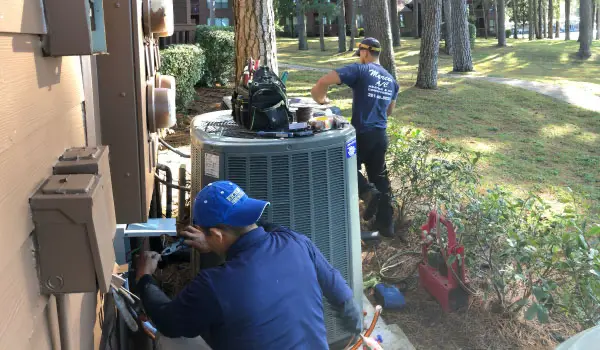 hvac techs working outside